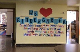 sign in hallway that reads we love kindergarten